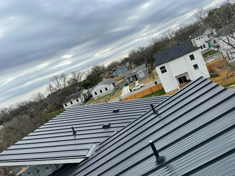 Standing seam metal roof panels with vents for Skylight Repair in Valley Park